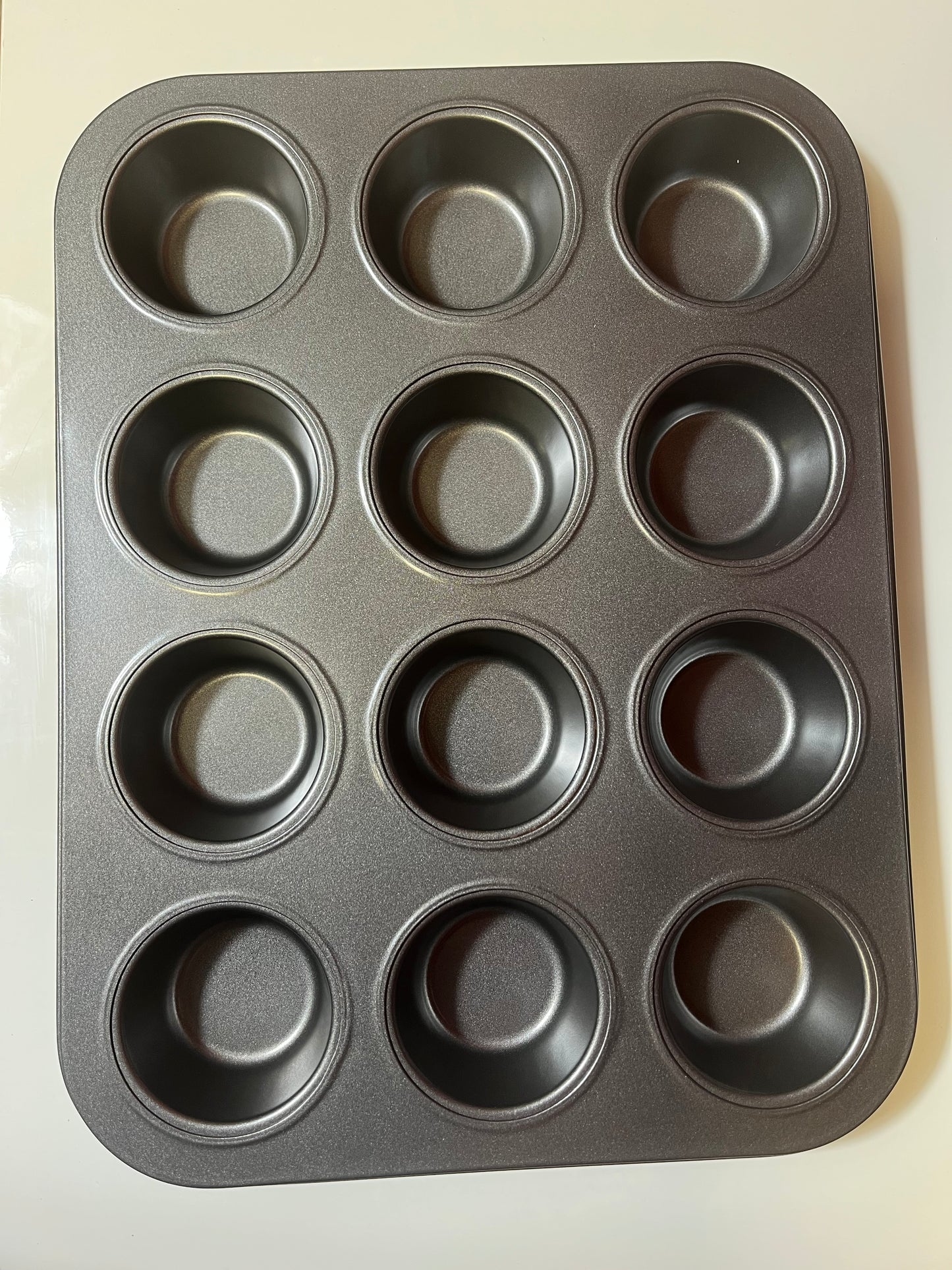 Moule muffins 12 cavités.