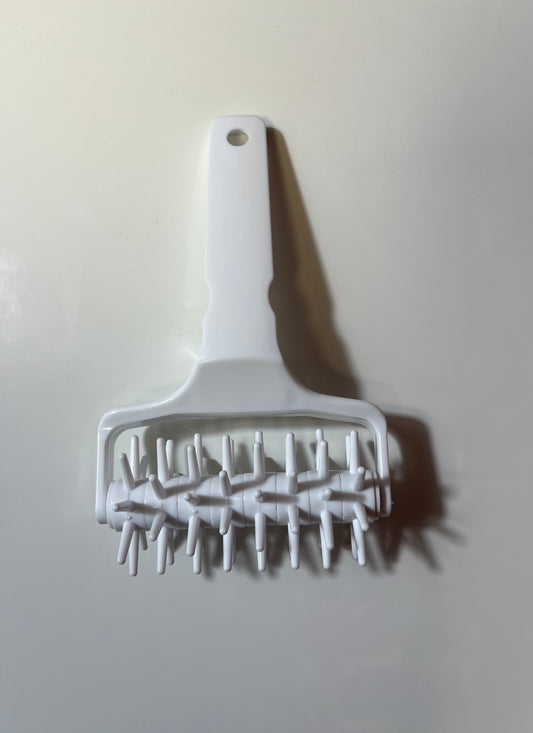 Roulette pique pâte.